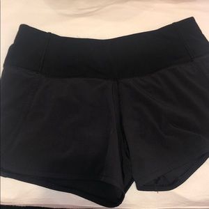 BLACK LULULEMON 4’ SHORTS. NWOT